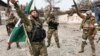 Российские военные из чеченского батальона «Ахмат» в украинском Мариуполе, 17 апреля 2022 года