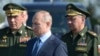 Слева направо: Валерий Герасимов, Владимир Путин и Сергей Шойгу 