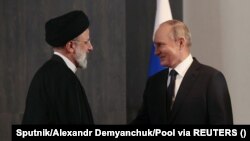 Ирандын президенти Ибрагим Раиси менен орус лидери Владимир Путин. Архивдик сүрөт. 