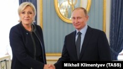 ლე პენი და ვლადიმირ პუტინი. მოსკოვი, 24 მარტი, 2017 წ.