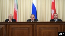 Орусия, Иран жана Түркиянын башкы дипломаттары Сергей Лавров, Жавад Зариф жана Мевлүт Чавушоглу. 