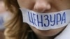 Участница акции против цензуры в Интернете