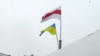 Belarus - Ukrainian and Belarusian flags on the roof of Kastus Zhukouski house in Homel, 9Dec2013