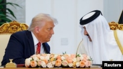د امریکا ولسمشر په دوحه کې د قطر له امیر سره. ارشیف