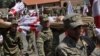 При принятии решения, проводить или нет военный парад в День независимости 26 мая, грузинские власти должны максимально учесть мнение всего общества