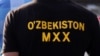Өзбекстан қауіпсіздік қызметінің киімін киген адам. (Көрнекі сурет)