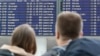 Информационное табло в аэропорту Мюнхена, Германия, 3 октября 2025 года