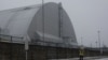 The structure over the Chernobyl Nuclear Power Plant's damaged reactor. (file photo)