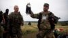 Пророссийские сепаратисты на месте крушения малайзийского "Боинга" в Донецкой области. Июль 2014 года
