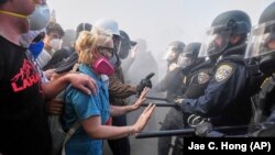 Лос-Анжелес шаарында мыйзамсыз мигранттарды жапырт кармоого каршы тутанган нааразылык акциялар