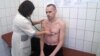 Алег Сянцоў падчас мэдычнага агляду ў калёніі 28 верасьня